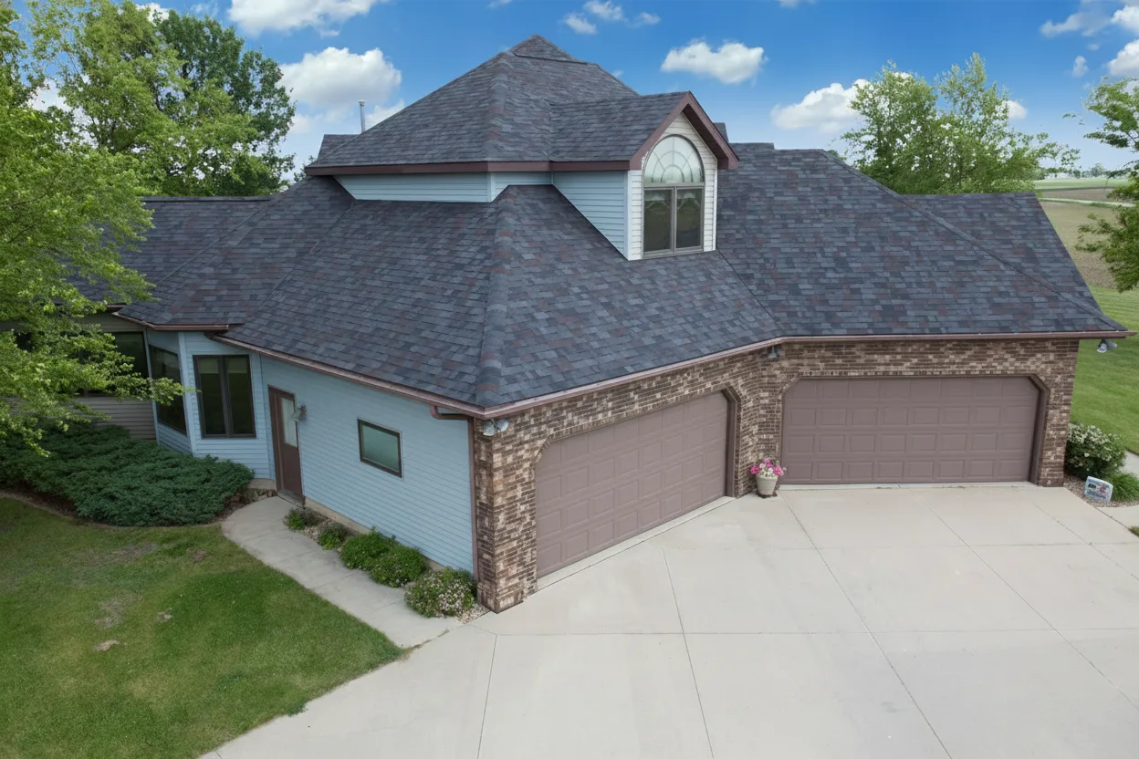 Light Blue house with Charcoal roof using Vista Black Oak