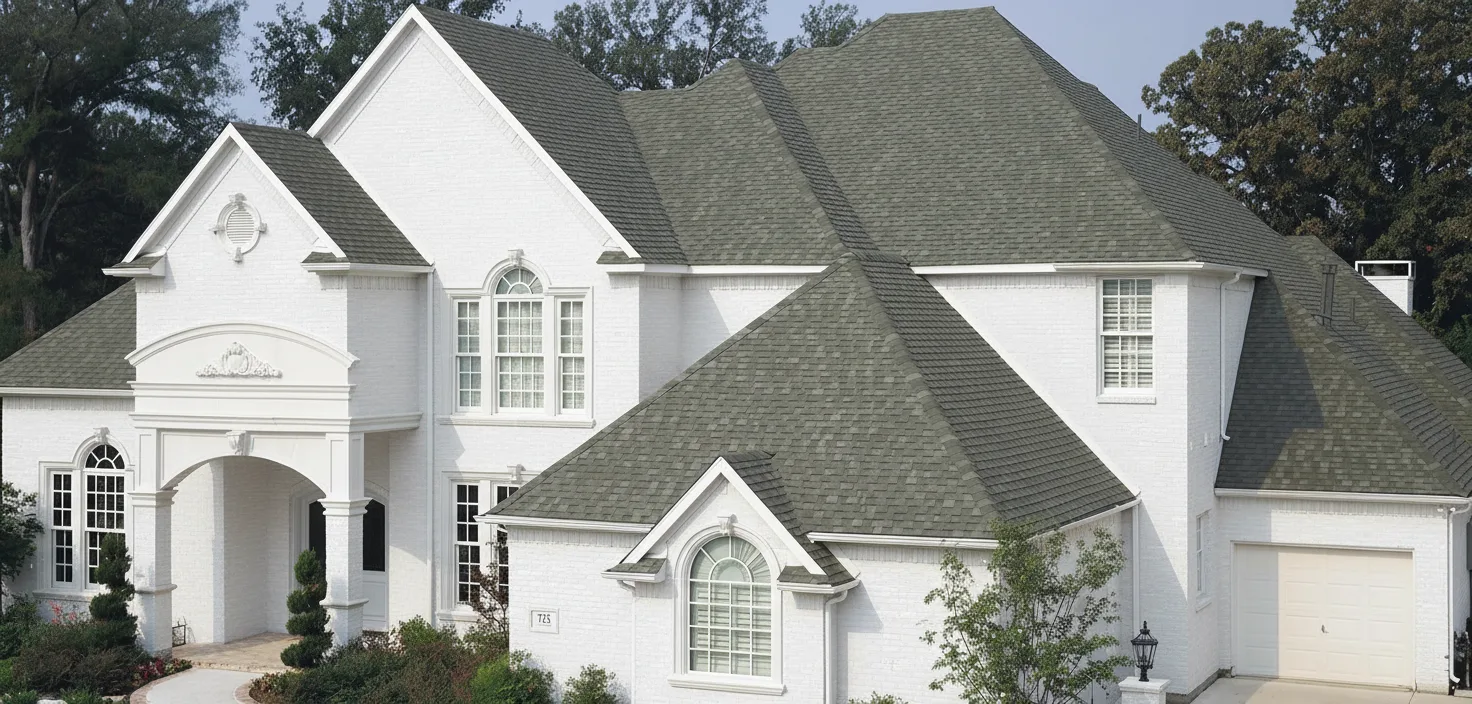 White house with Charcoal roof using Heritage Oxford Grey